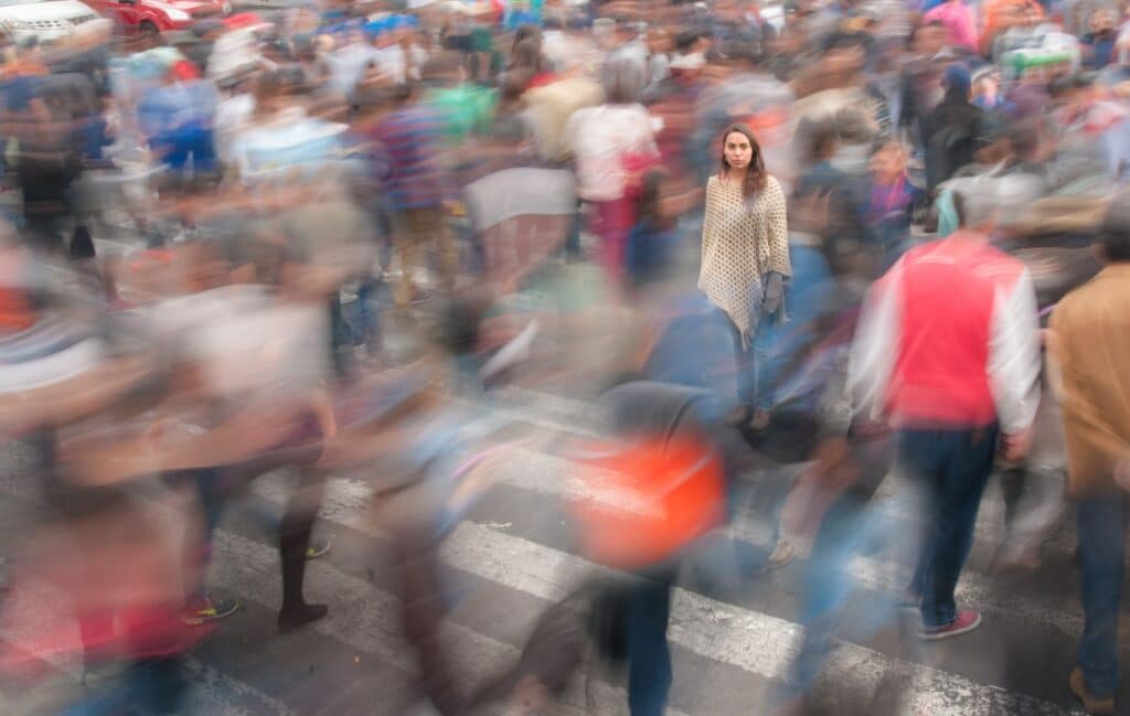 photo of a woman in a crowded marketplace