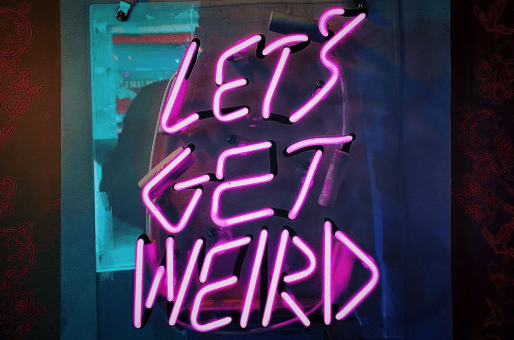 sign that says lets get weird