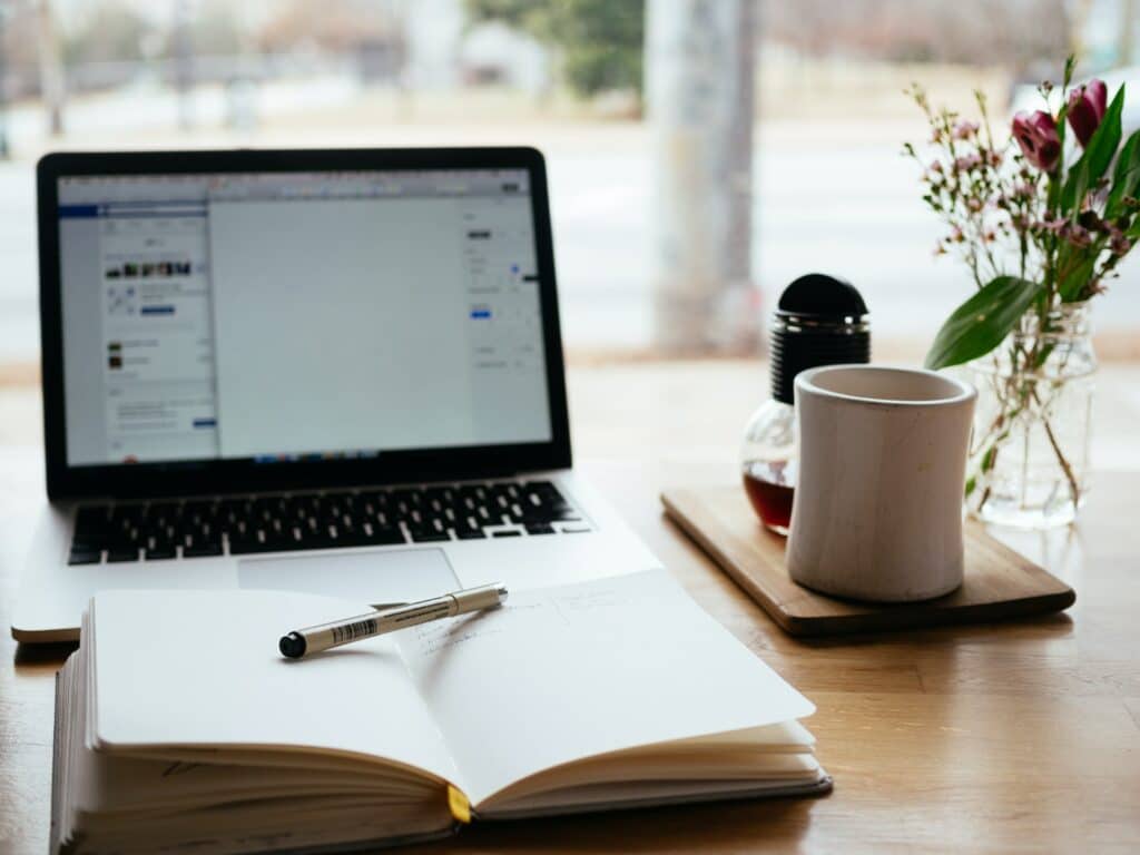 desk with computer and tea