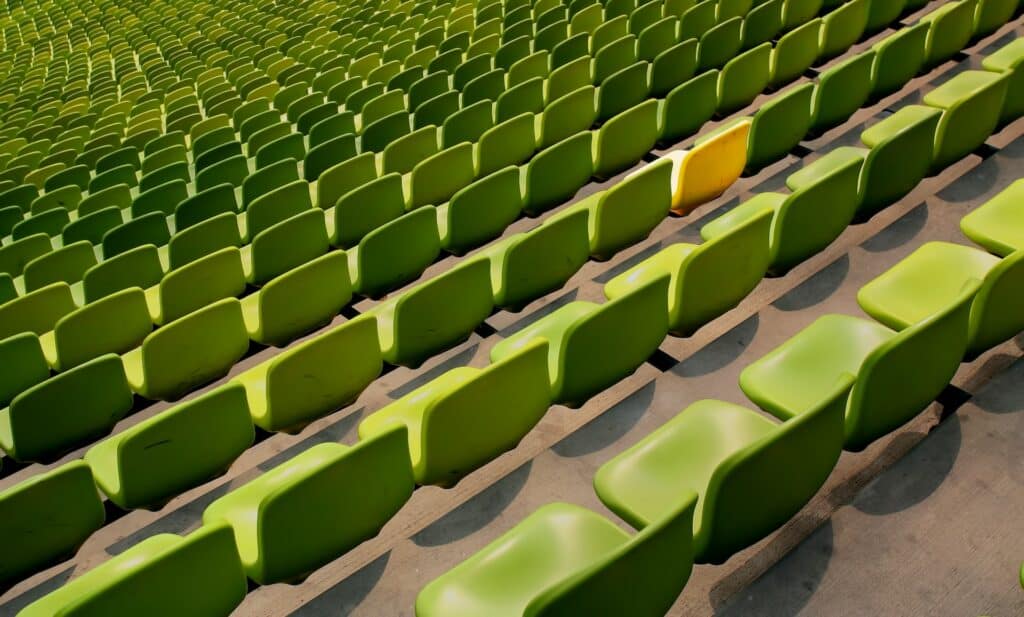 lots of green seats, with 1 yellow seat